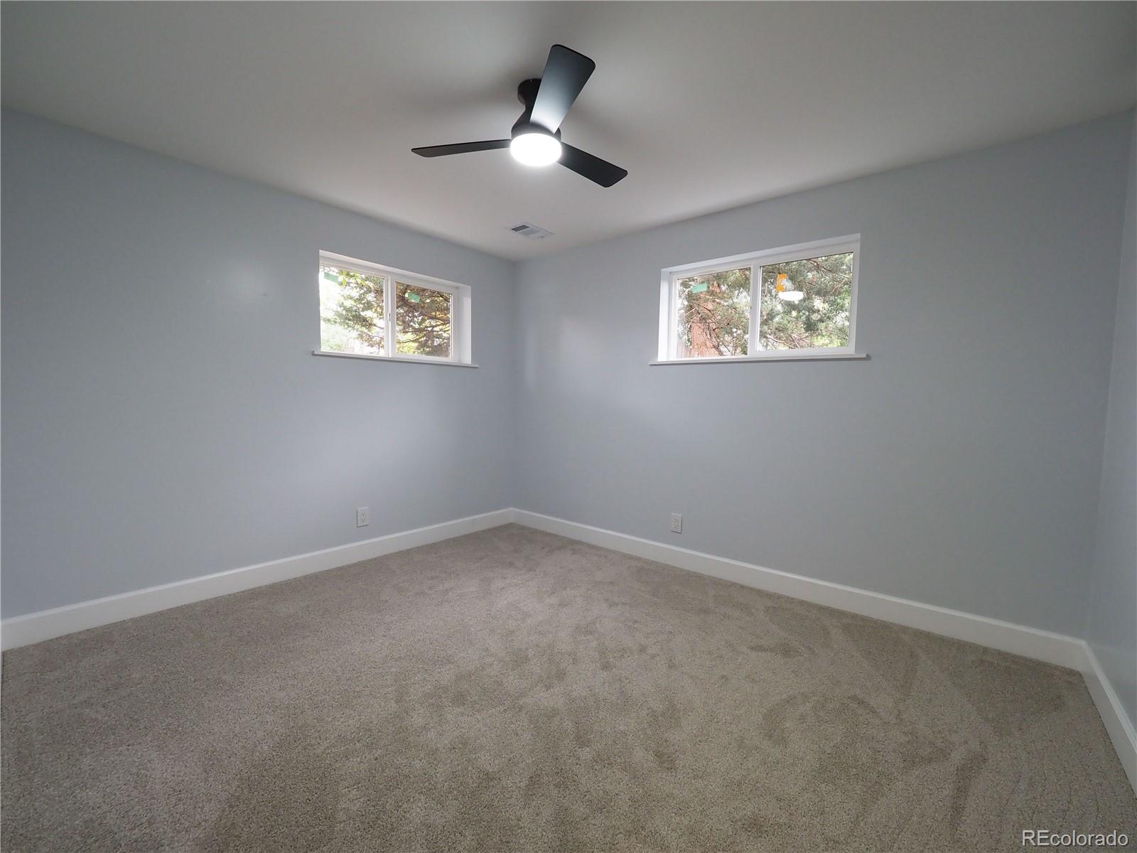 6751 South Downing Circle West Centennial, CO 80122 - Photo 19 of 34 an empty room with a window