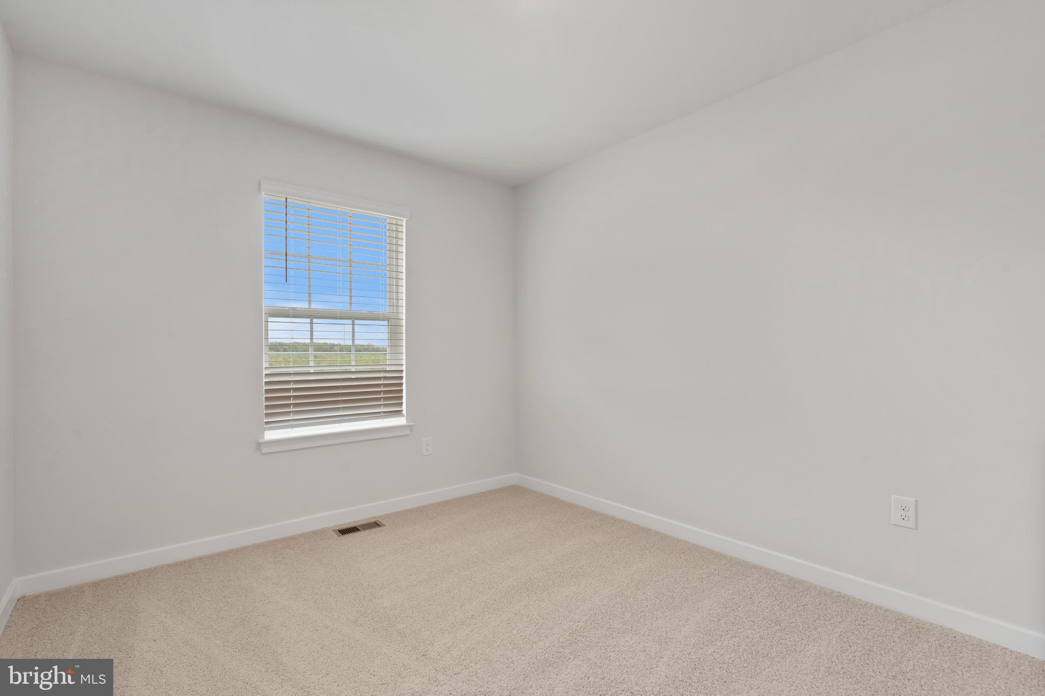 7520 Silver Thread Way Brandywine, MD 20613 - Photo 19 of 32 a view of an empty room with a window