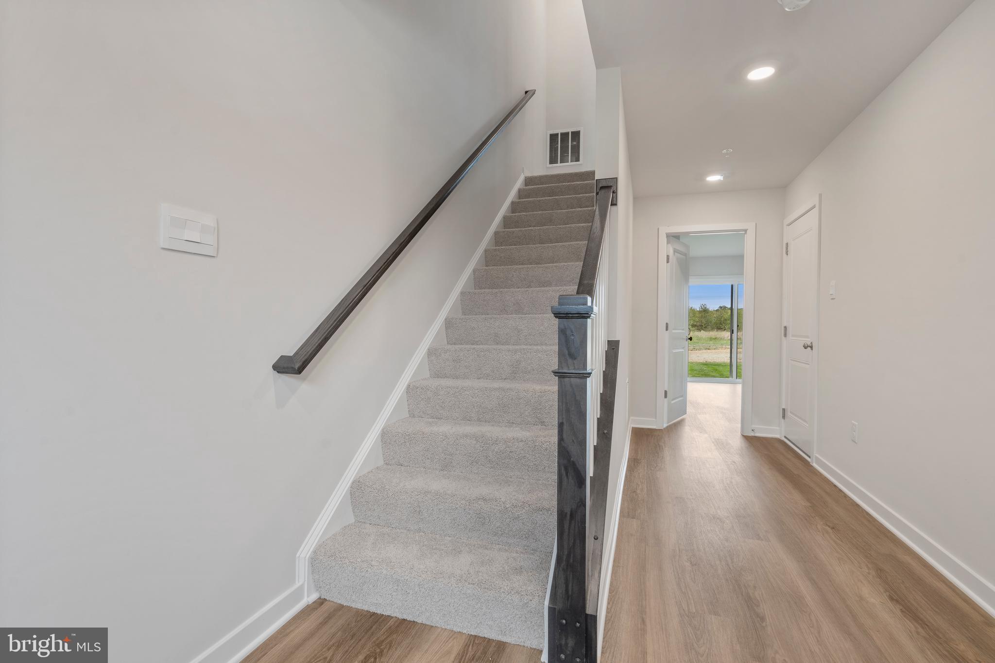 7520 Silver Thread Way Brandywine, MD 20613 - Photo 3 of 32 a view of entryway and hall with wooden floor