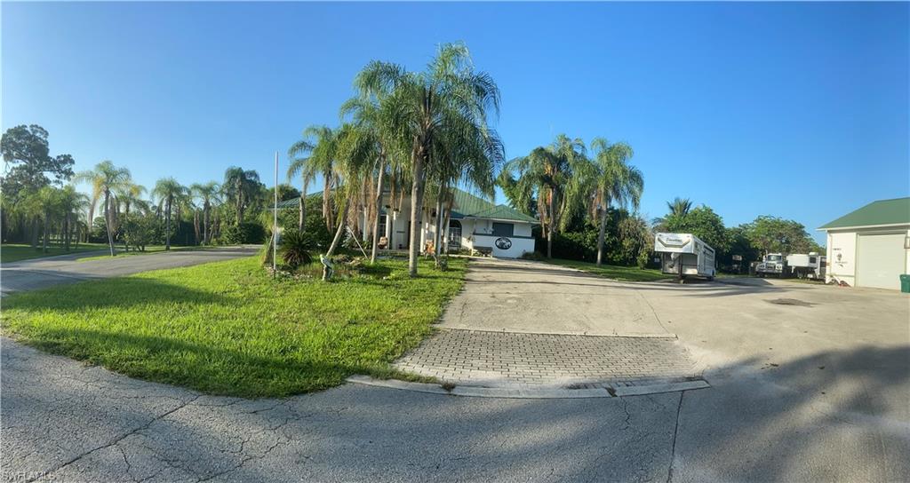 2400 Oil Well Road Naples, FL 34120 - Photo 13 of 35 a view of a backyard