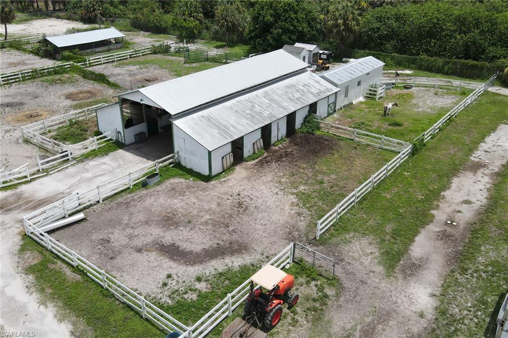 2400 Oil Well Road Naples, FL 34120 - Photo 34 of 35 an aerial view of a house with a yard