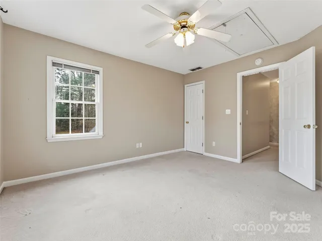 a bathroom with a sink a mirror and vanity