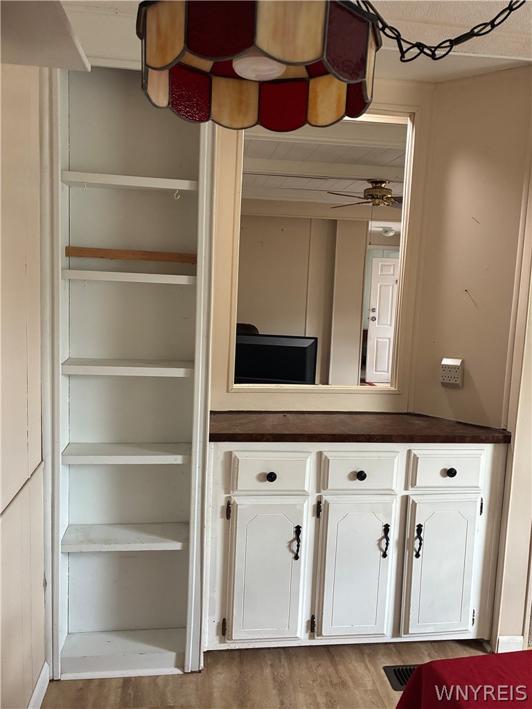 6035-286 South Transit Road, Unit 286 Lockport, NY 14094 - Photo 17 of 48 BI TV CABINET- STORAGE/NEW WINDOWS