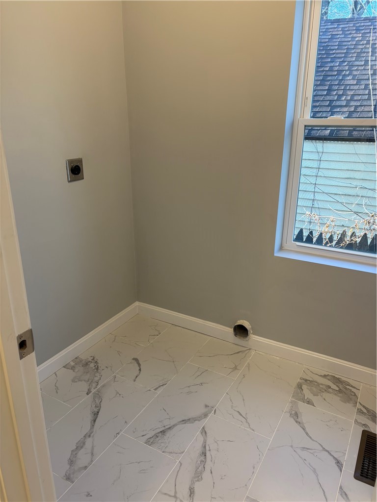 184 Avenue C, Unit M3 Woonsocket, RI 02895 - Photo 10 of 10 Laundry room on the main level.