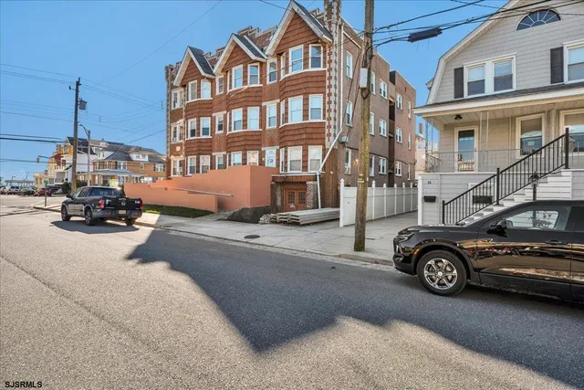 a car parked in front of a building