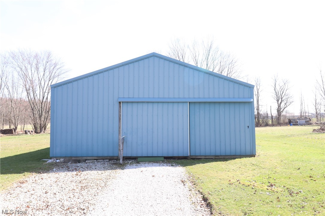 7879 Beach Road Wadsworth, OH 44281 - Photo 22 of 27 View of outdoor structure with a lawn