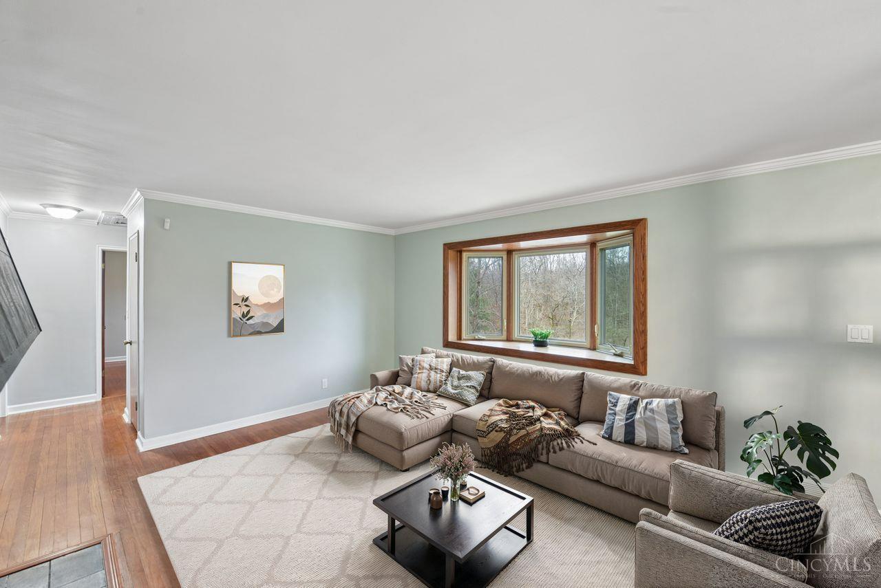 5258 Shepherd Road Cincinnati, OH 45223 - Photo 20 of 43 A view of the Living Room with virtual staging showing the Bay Window that overlooks the Front Yard and the park across the street.