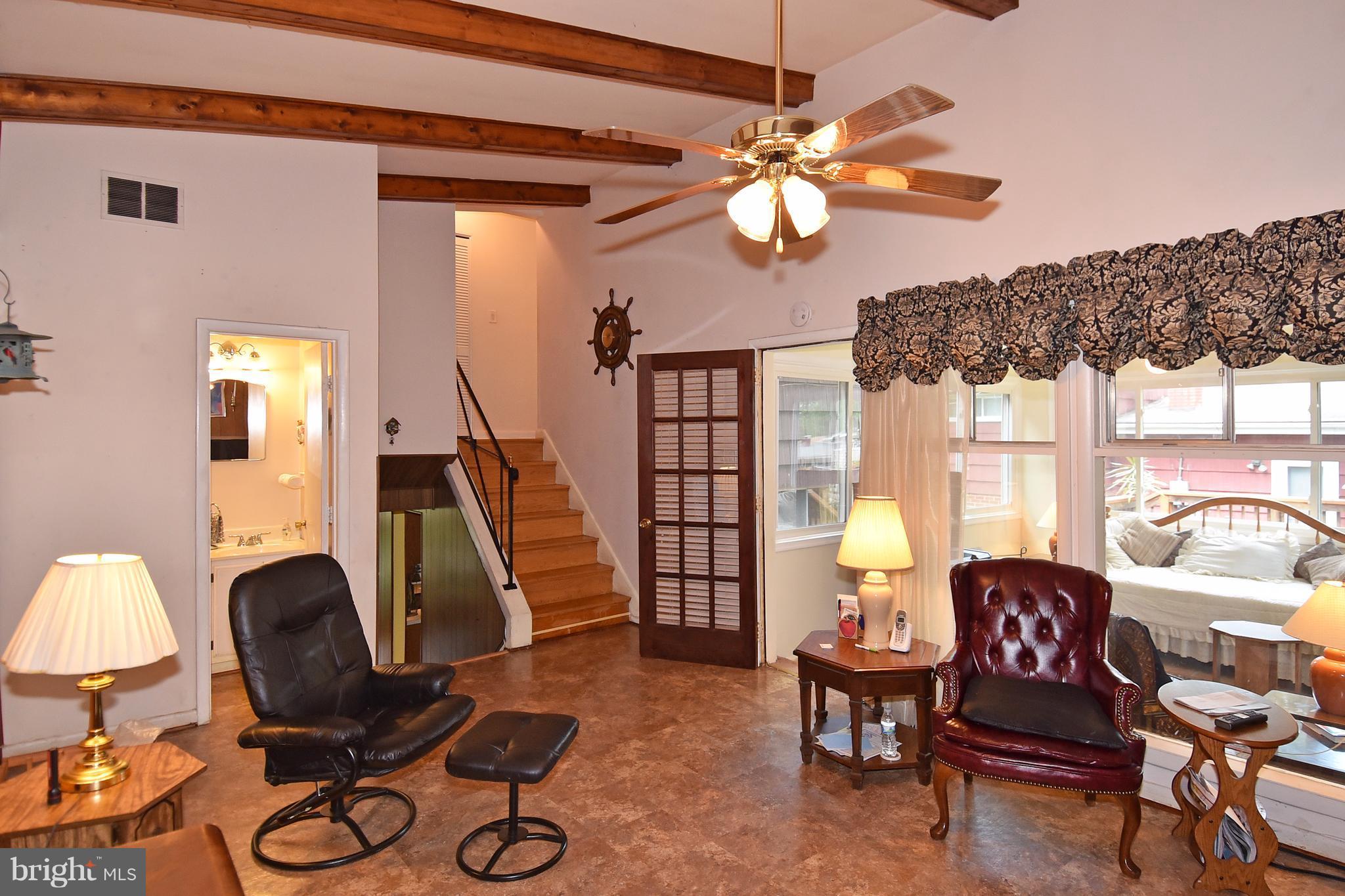 828 Hyde Road Silver Spring, MD 20902 - Photo 11 of 30 Family Room Walkout to Sun Room