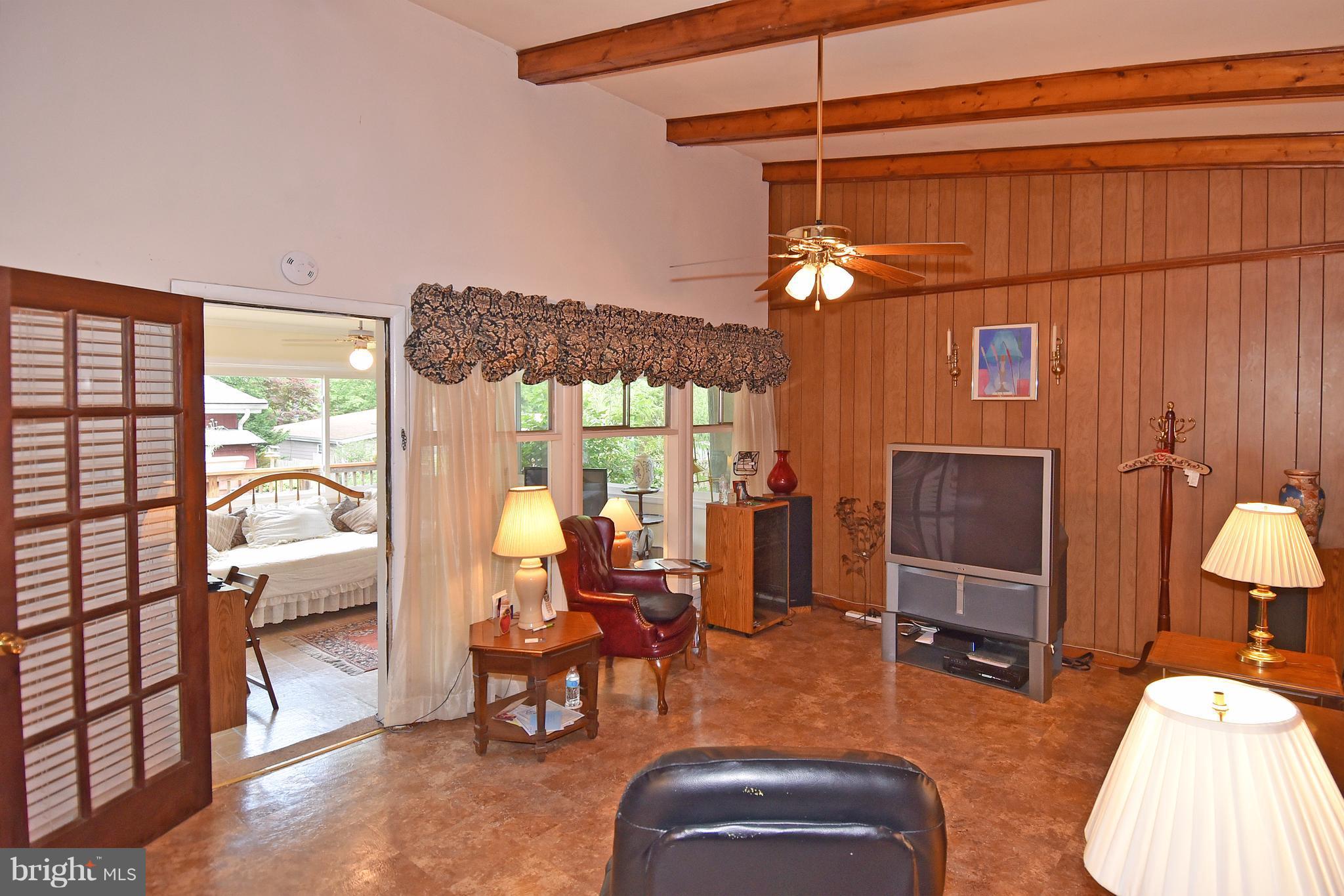 828 Hyde Road Silver Spring, MD 20902 - Photo 10 of 30 Family Room Walkout to Sun Room