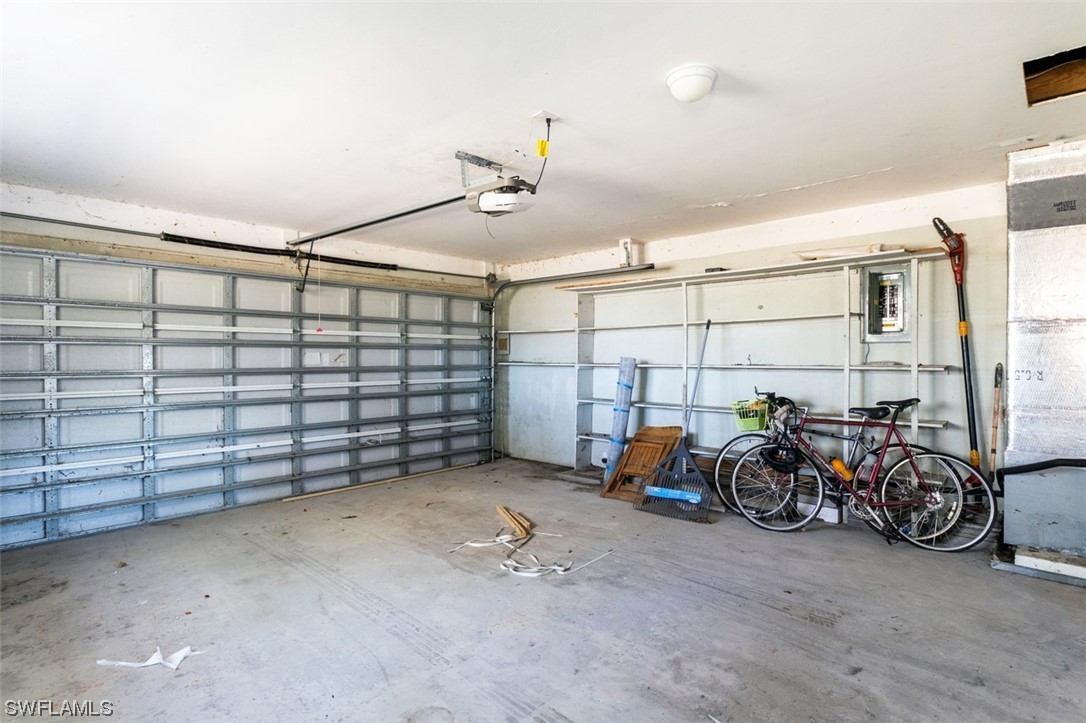 951 Sand Castle Road Sanibel, FL 33957 - Photo 24 of 27 a view of a garage with storage