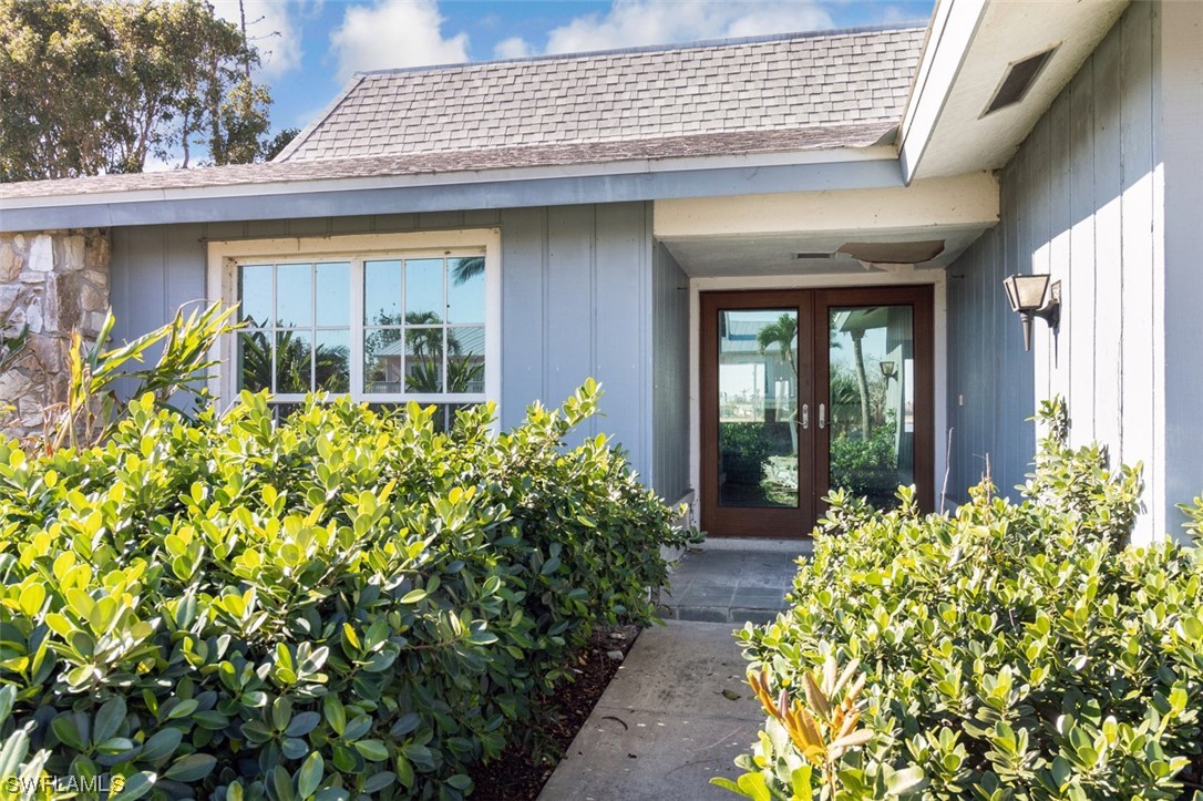 951 Sand Castle Road Sanibel, FL 33957 - Photo 8 of 27 front view of a house