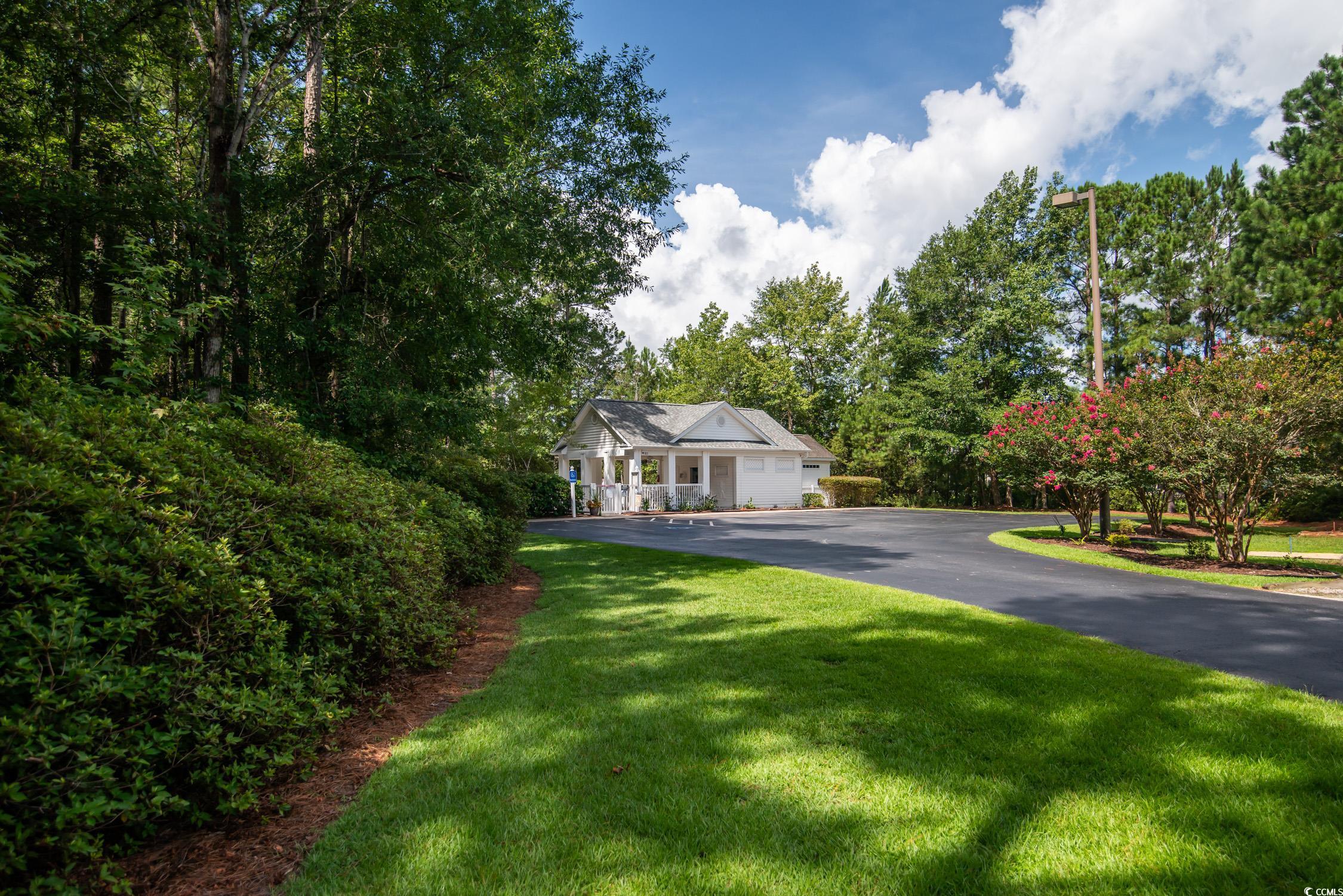 1052 Vestry Drive Murrells Inlet, SC 29576 - Photo 32 of 40 View of front of house featuring a front lawn