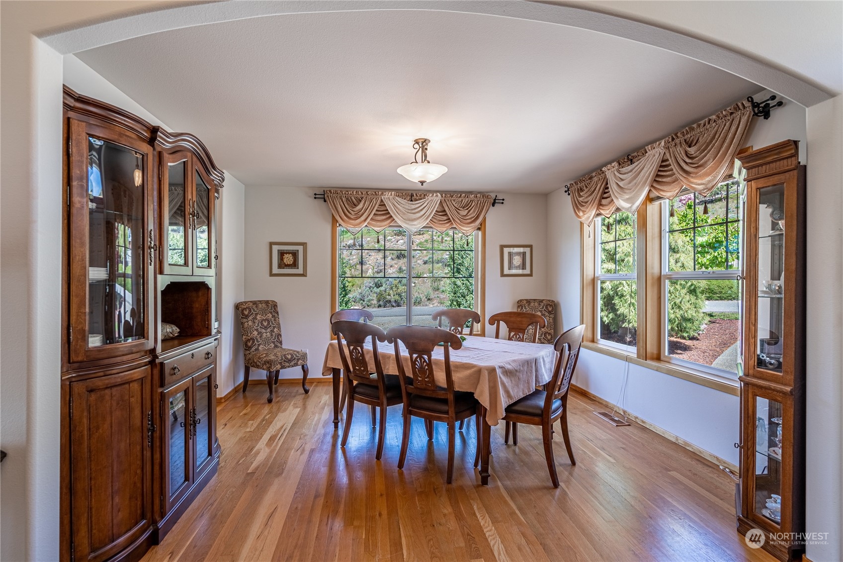 114 Long Drive Chelan, WA 98816 - Photo 20 of 38 a view of a dining room with furniture window and wooden floor