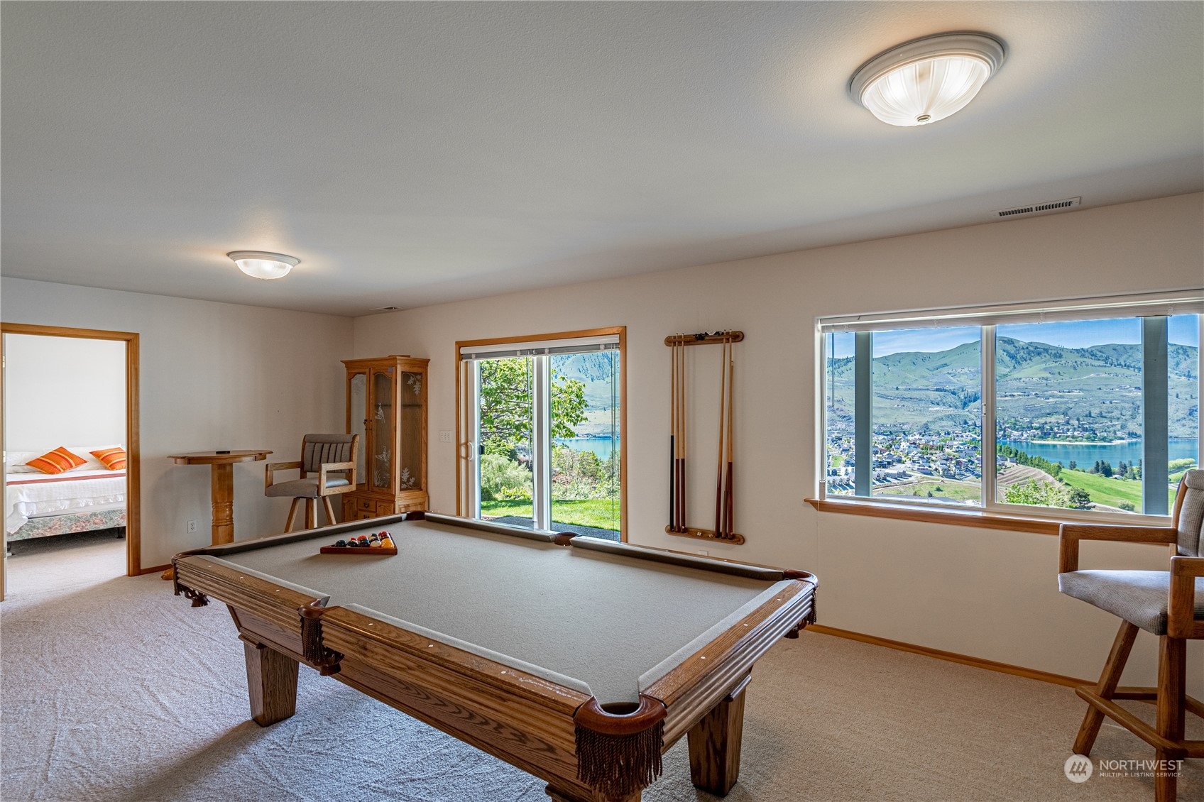 114 Long Drive Chelan, WA 98816 - Photo 33 of 38 a living room with furniture pool table and a window