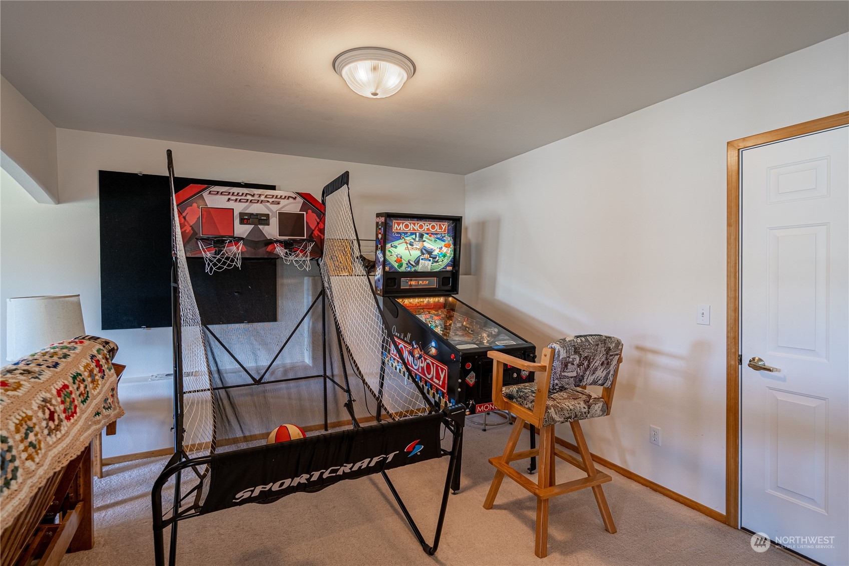 114 Long Drive Chelan, WA 98816 - Photo 34 of 38 a living room with furniture and a flat screen tv