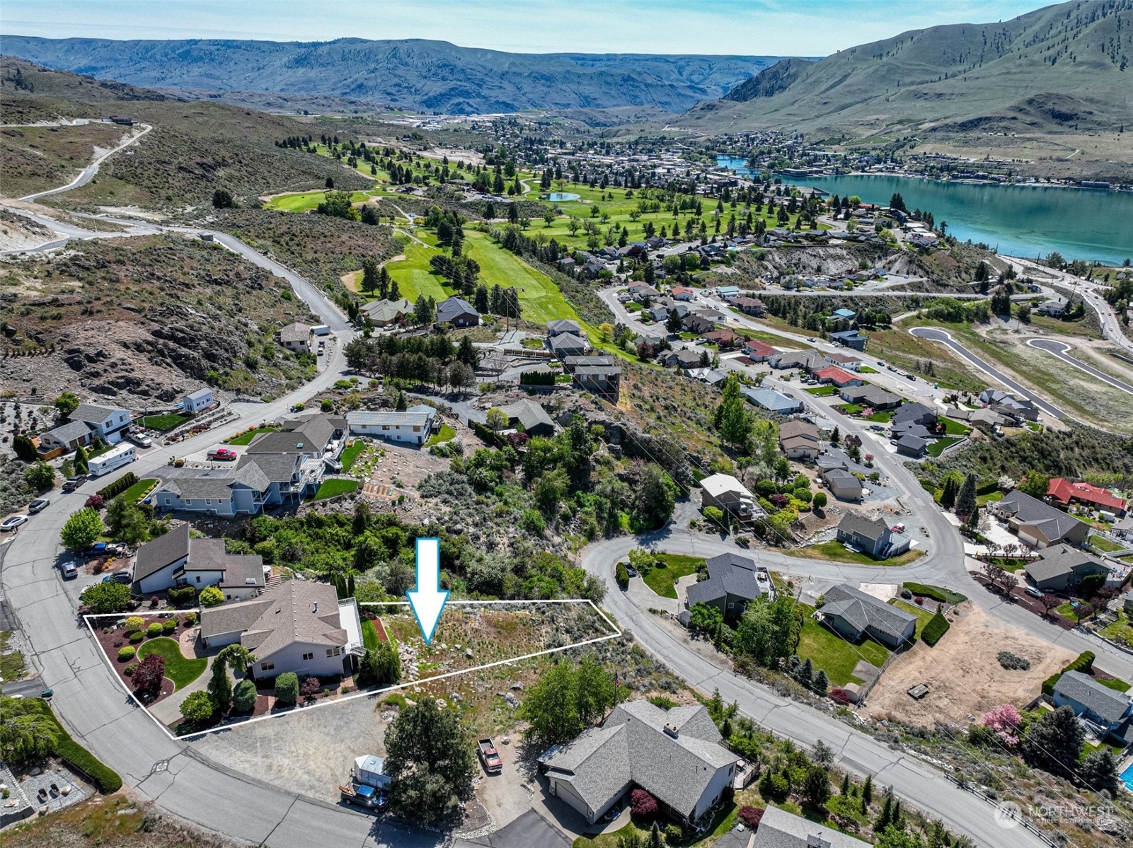 114 Long Drive Chelan, WA 98816 - Photo 37 of 38 an aerial view of a city with lots of residential buildings