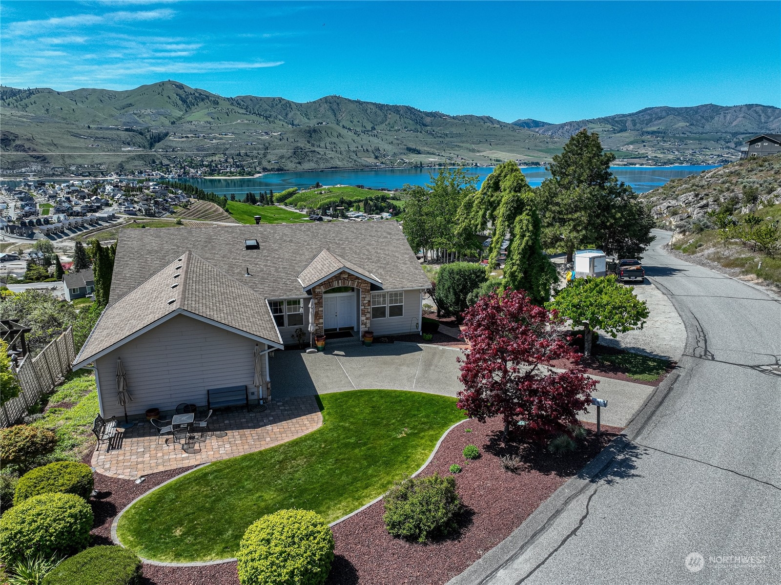 114 Long Drive Chelan, WA 98816 - Photo 4 of 38 an aerial view of house with yard and mountain in the background