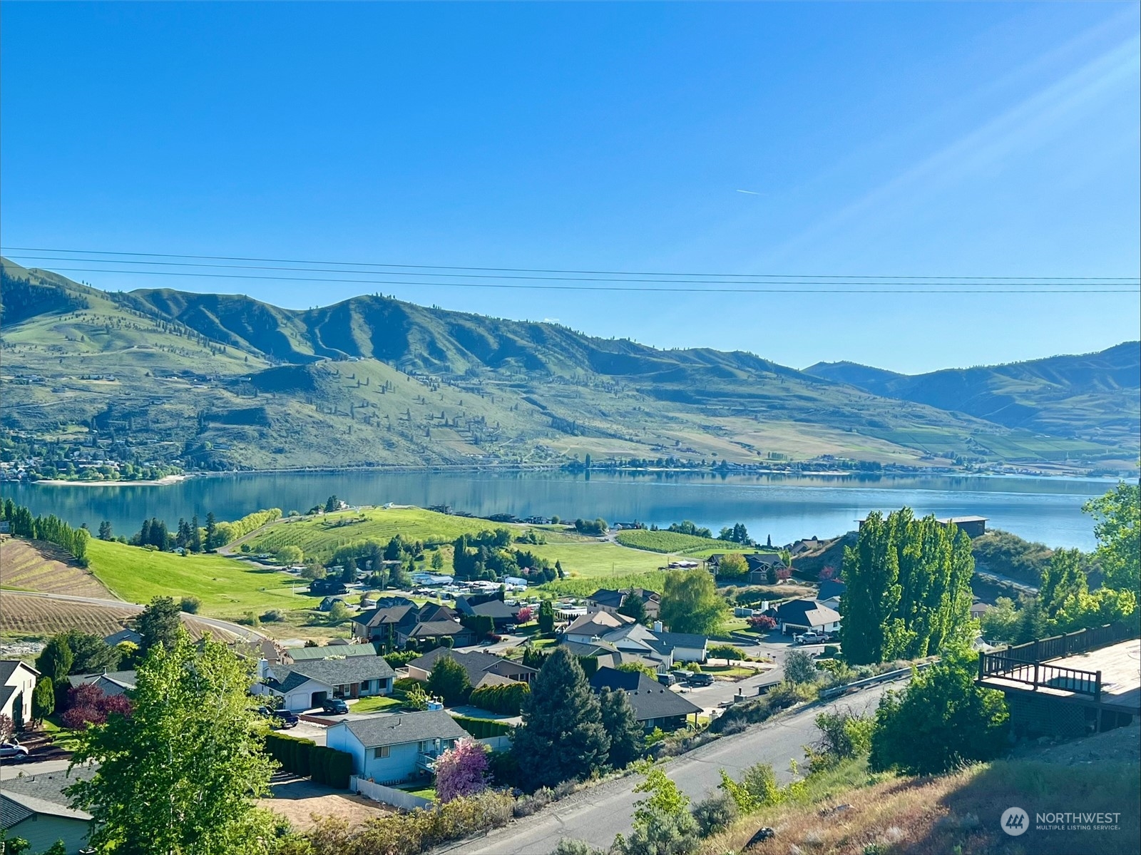 114 Long Drive Chelan, WA 98816 - Photo 6 of 38 a view of a garden with an ocean