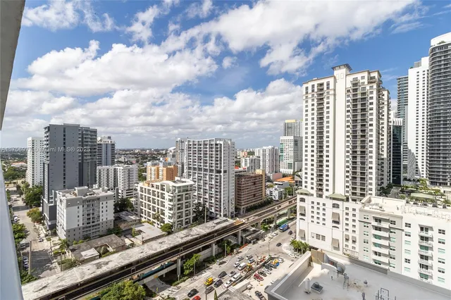 a city view with tall buildings