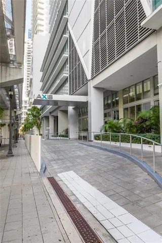 a view of a building with a yard