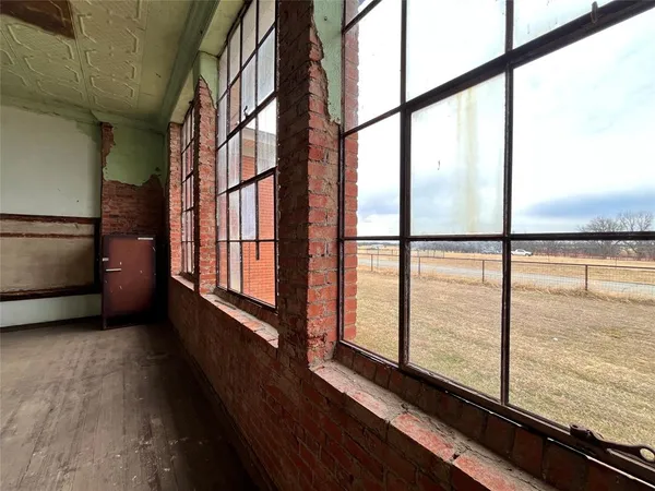 a room with furniture and a window