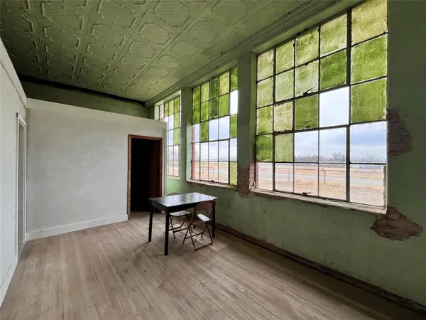 a view of a workspace with furniture
