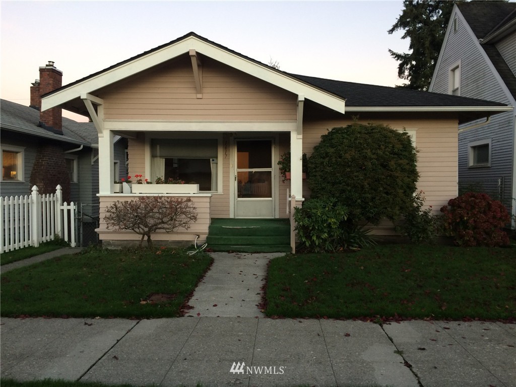 1617 Rockefeller Avenue Everett, WA 98201 - Photo 1 of 1 a front view of a house with a yard