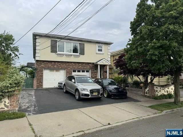 a car parked in front of a house