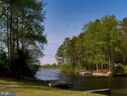 200 Victoria Drive Ruther Glen, VA 22546 - Photo 38 of 45 a view of a lake with houses