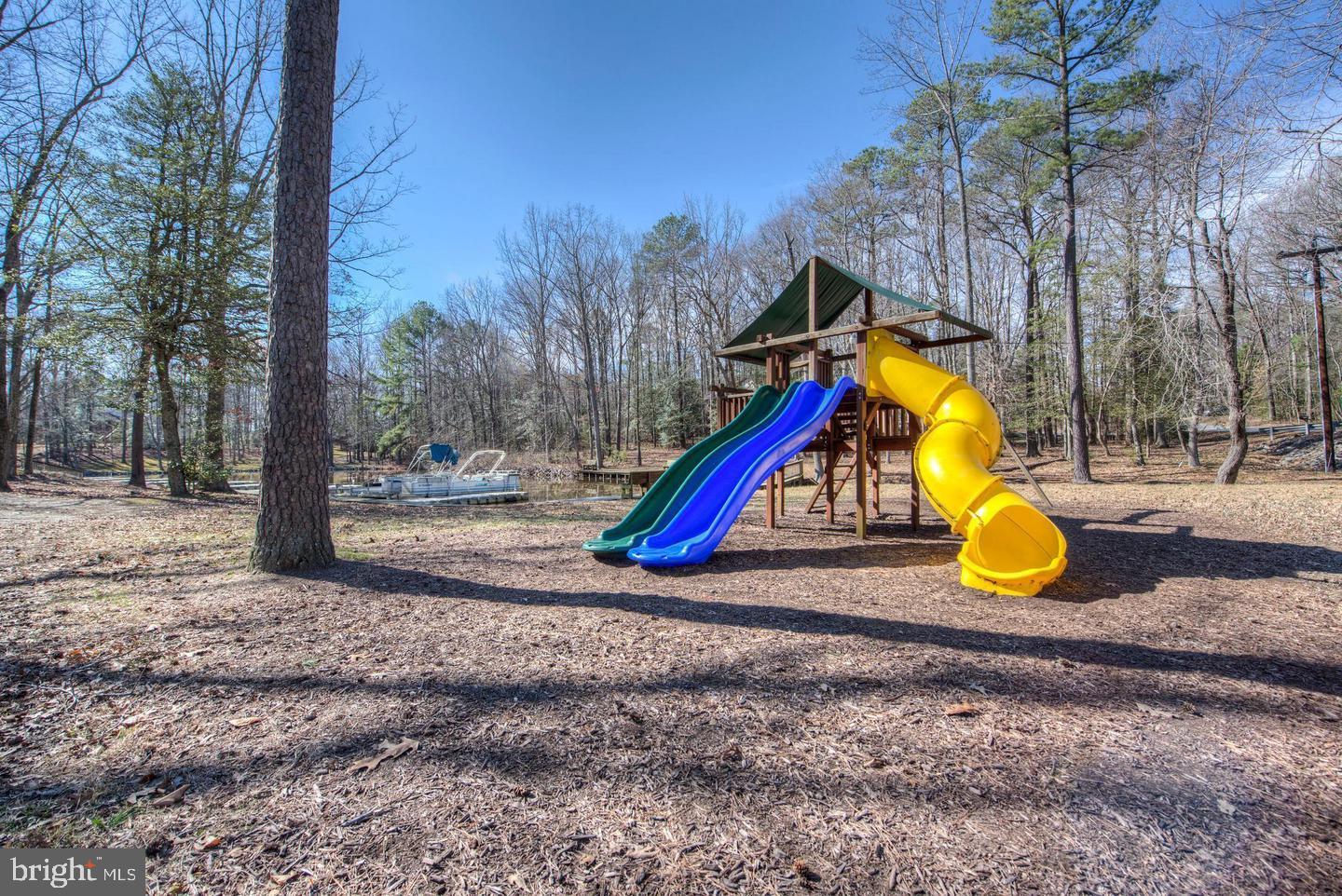 200 Victoria Drive Ruther Glen, VA 22546 - Photo 41 of 45 a view of a park with slide and a slide