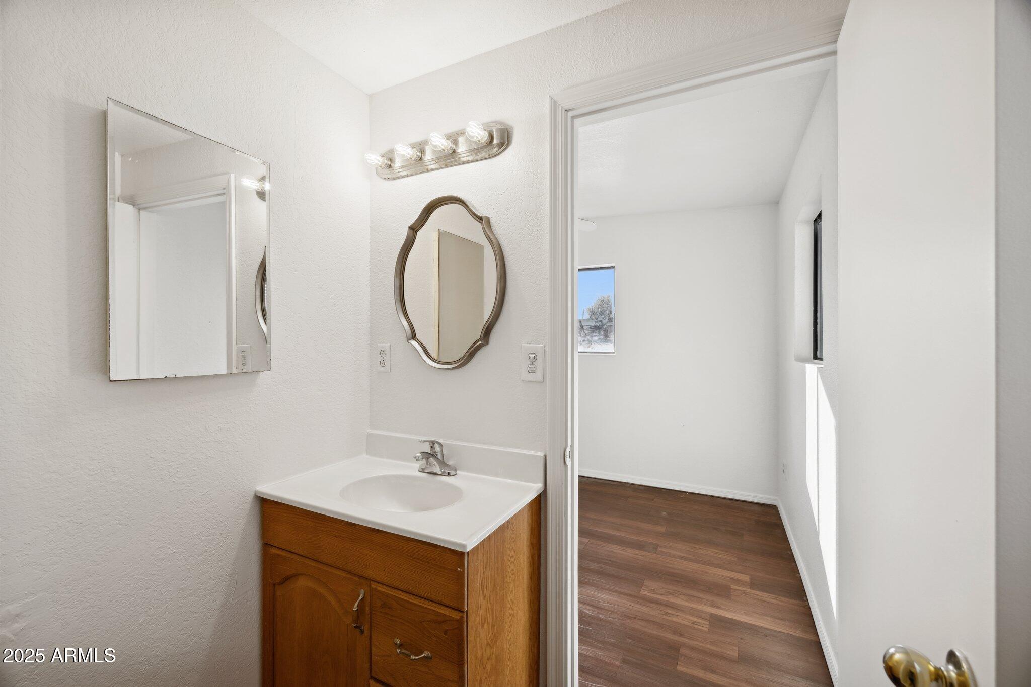 1614 East Roma Avenue Phoenix, AZ 85016 - Photo 17 of 44 Updated vanity and mirror