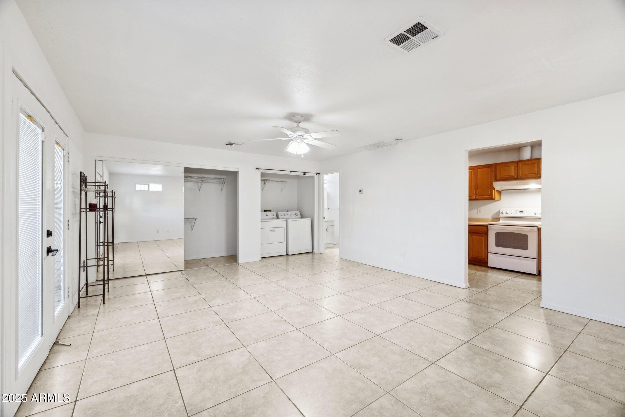 1614 East Roma Avenue Phoenix, AZ 85016 - Photo 29 of 44 a view of a kitchen with a sink and a refrigerator