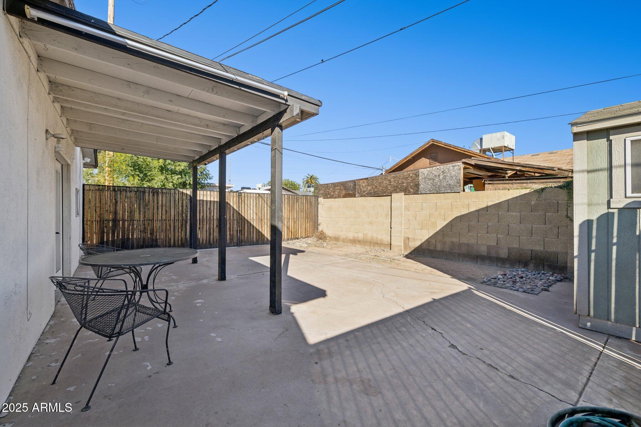 1614 East Roma Avenue Phoenix, AZ 85016 - Photo 38 of 44 a patio with table and chairs