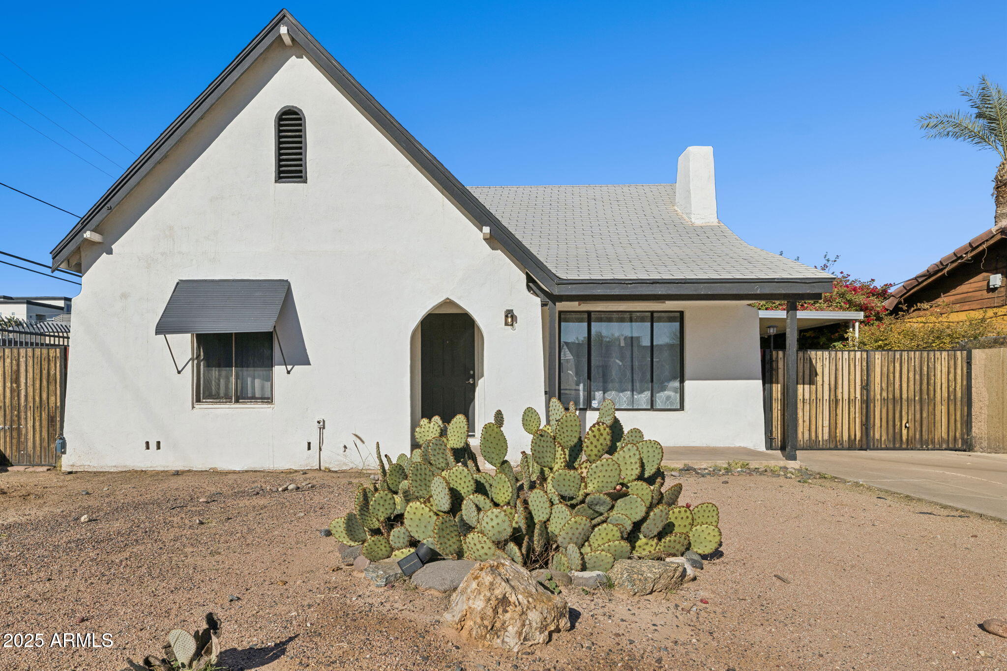 1614 East Roma Avenue Phoenix, AZ 85016 - Photo 41 of 44 a front view of a house with a yard