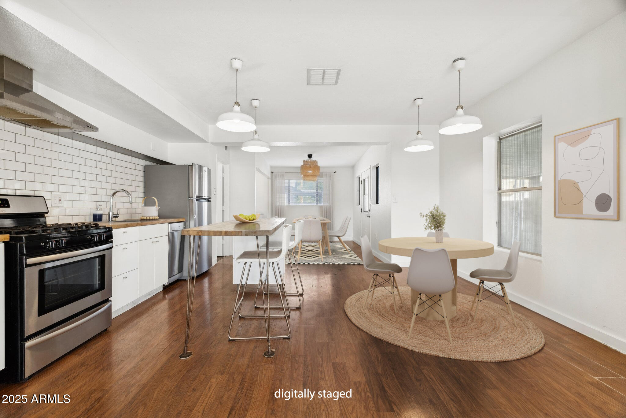 1614 East Roma Avenue Phoenix, AZ 85016 - Photo 3 of 44 a very nice looking dining room with a table and chairs