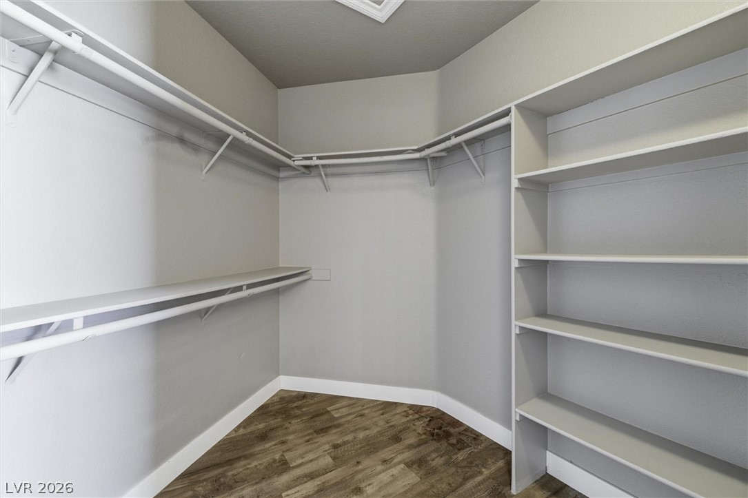 2780 West Simkins Road Pahrump, NV 89060 - Photo 27 of 40 Ample shelving and hanging space defines this organized, ready-to-personalize walk-in closet.