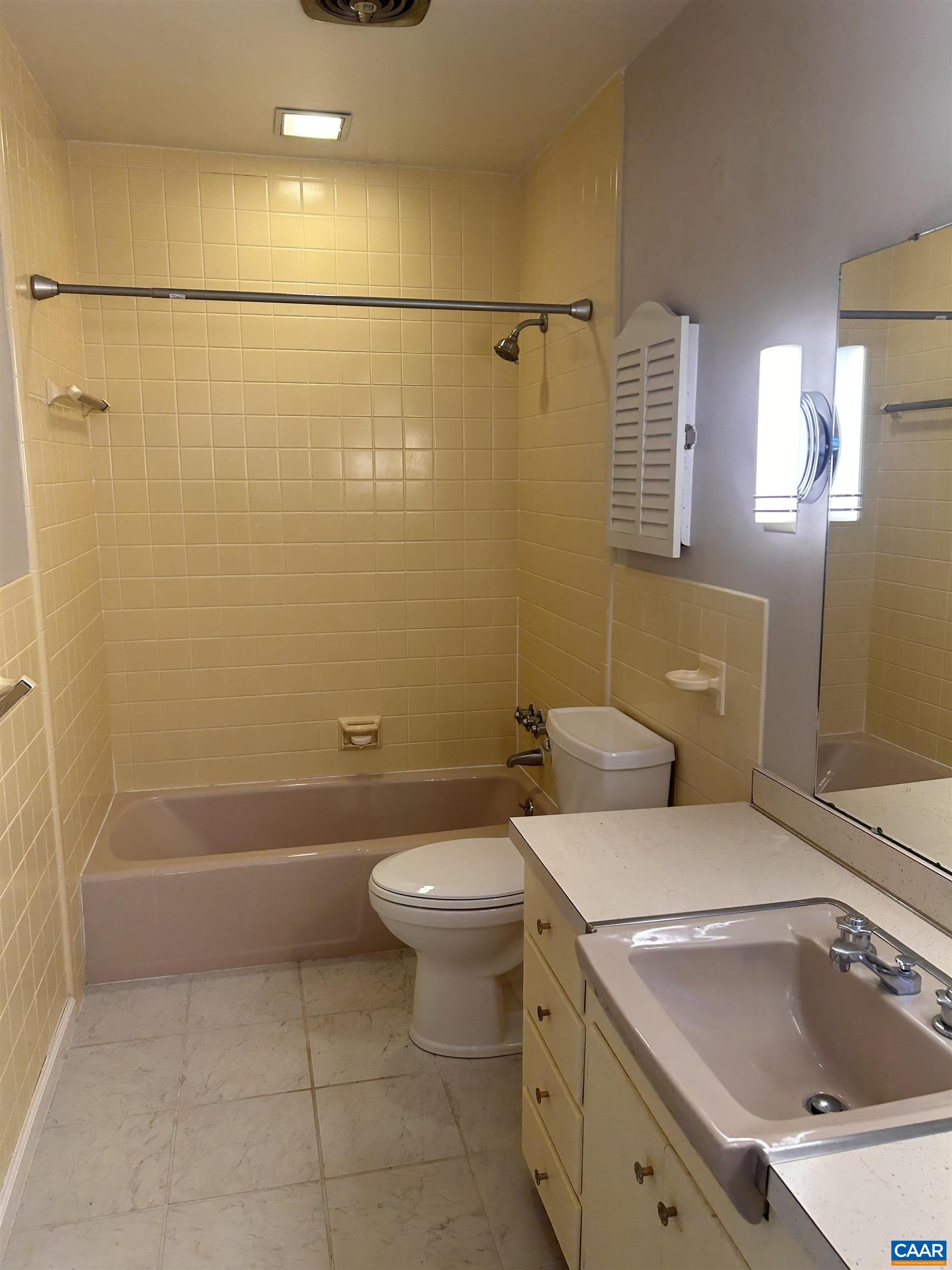 214 Montvue Drive Charlottesville, VA 22901 - Photo 14 of 30 a bathroom with a sink a toilet and shower