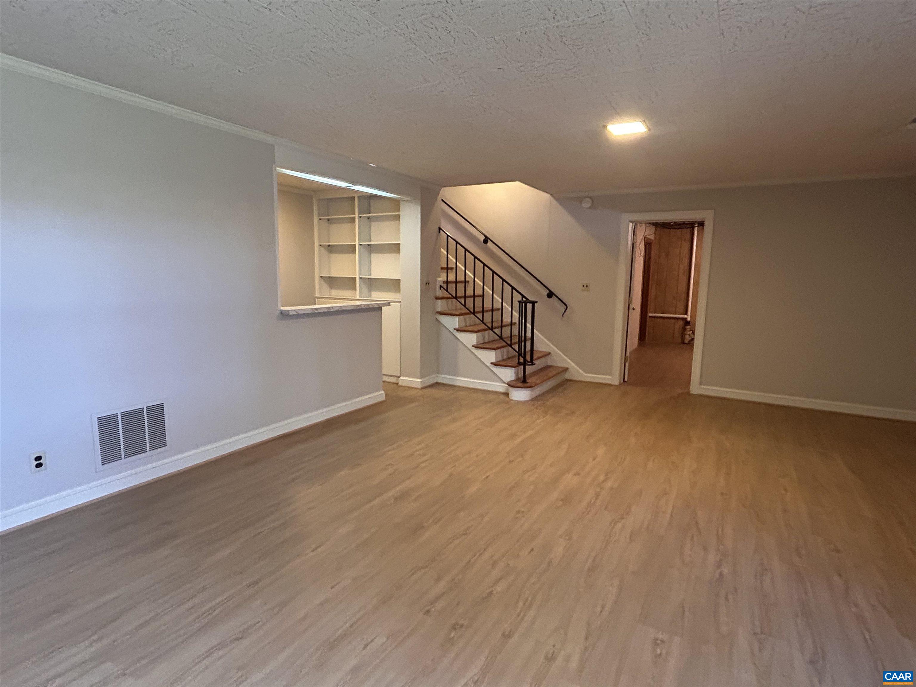 214 Montvue Drive Charlottesville, VA 22901 - Photo 23 of 30 a view of an empty room with stairs and a window