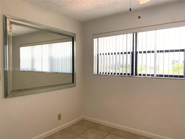 en empty room with windows