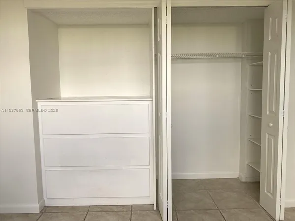 a bathroom with a bathtub and toilet
