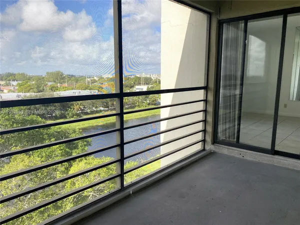a bathroom with a shower and a toilet