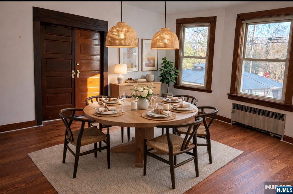 35 Marsellus Place, Unit 1 Garfield, NJ 07026 - Photo 6 of 37 a view of a dining room with furniture and chandelier