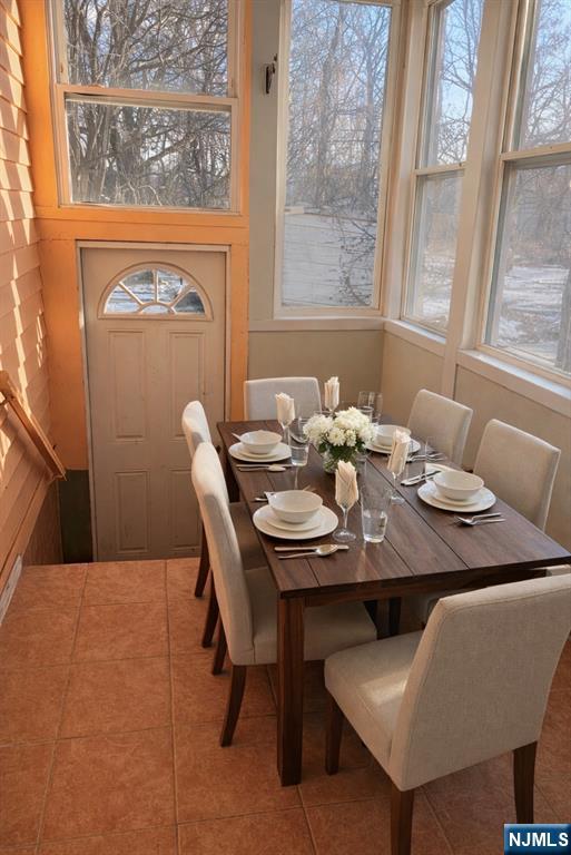 35 Marsellus Place, Unit 1 Garfield, NJ 07026 - Photo 9 of 37 a view of a dining room with furniture and window