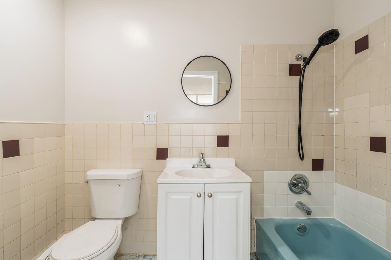 40 Beacon Avenue, Unit 5 Jersey City, NJ 07306 - Photo 10 of 20 a bathroom with a sink toilet and shower
