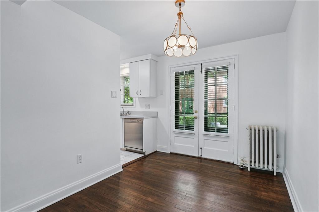 446 Olympia Road Pittsburgh, PA 15211 - Photo 11 of 31 an empty room with wooden floor and windows