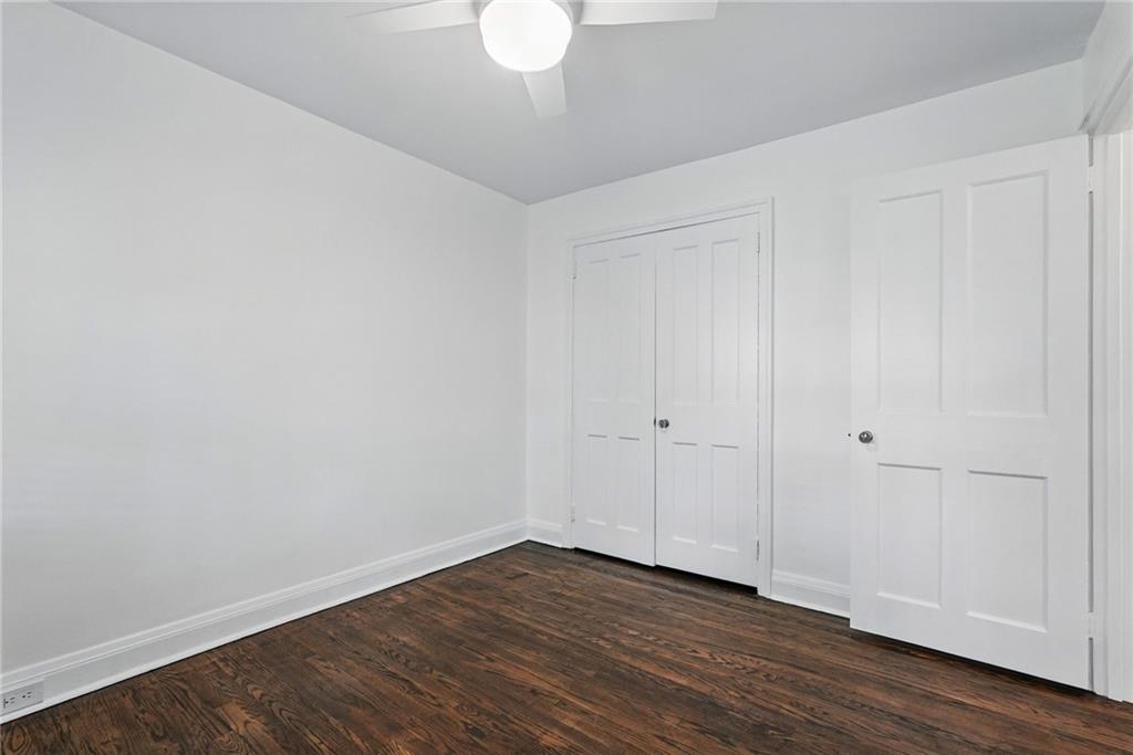 446 Olympia Road Pittsburgh, PA 15211 - Photo 20 of 31 a view of an empty room with wooden floor
