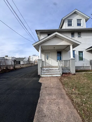 a view of a house with a patio