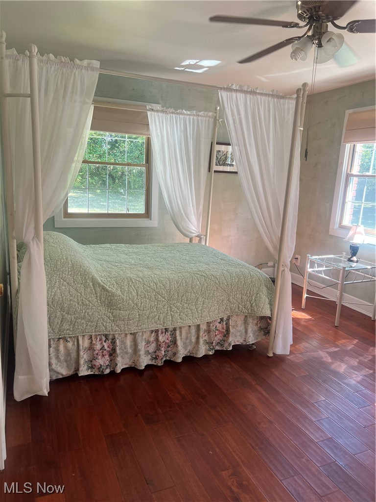 6171 Barrett Road Geneva, OH 44041 - Photo 25 of 38 Bedroom featuring dark wood-type flooring and ceiling fan