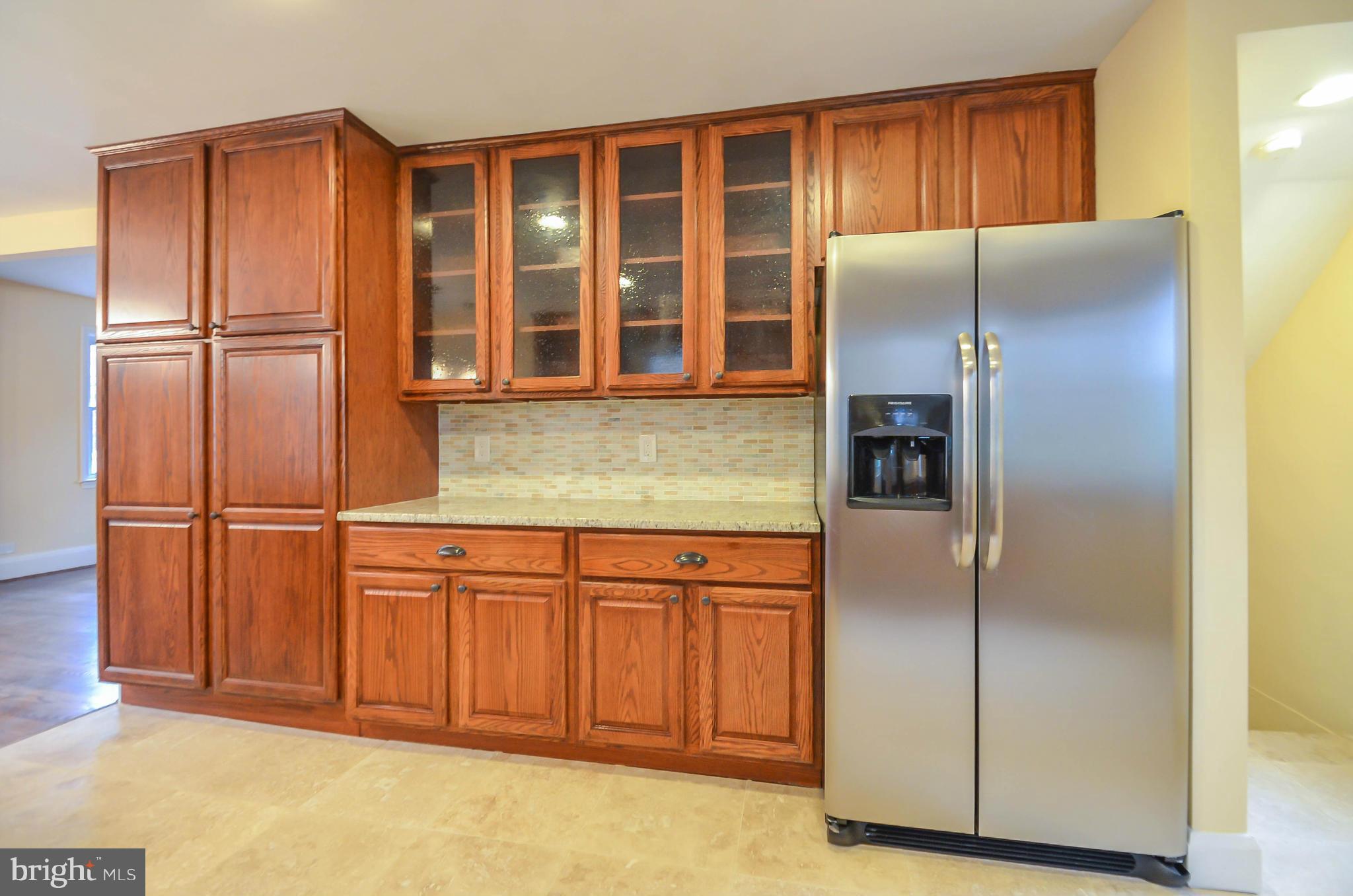 720 Overbrook Road Baltimore, MD 21212 - Photo 12 of 26 a kitchen with stainless steel appliances granite countertop a refrigerator and a sink