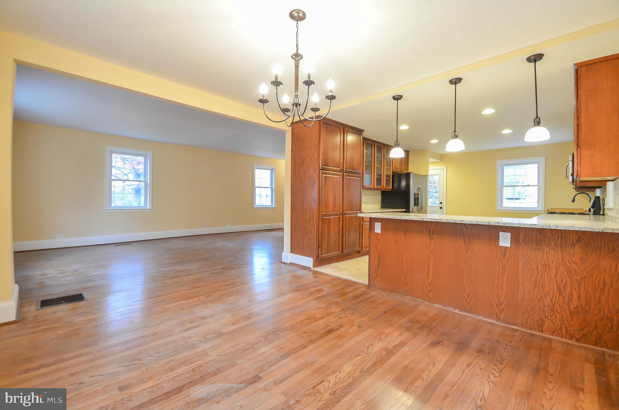 720 Overbrook Road Baltimore, MD 21212 - Photo 6 of 26 a view of a kitchen with marble kitchen and granite countertop wooden floor
